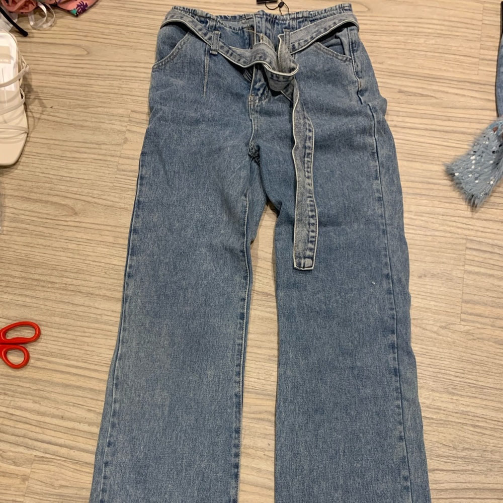 Bell bottom tie jeans